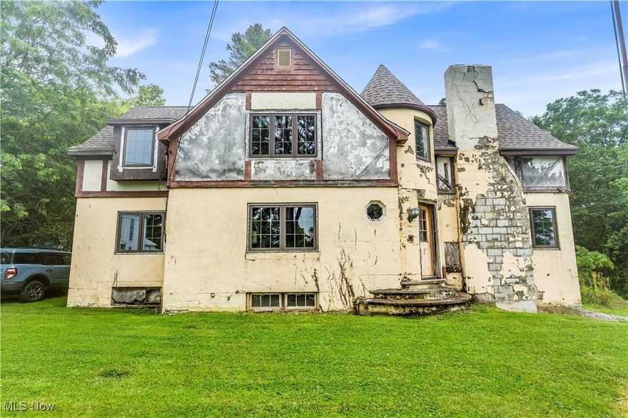 Great opportunity!! This house has so much potential. New roof & new windows. Over 2,000 square ft of living space. .70 acre of property. 2 bedrooms on main floor. Upstairs perfect for at least two more bedrooms to be added. So much potential!