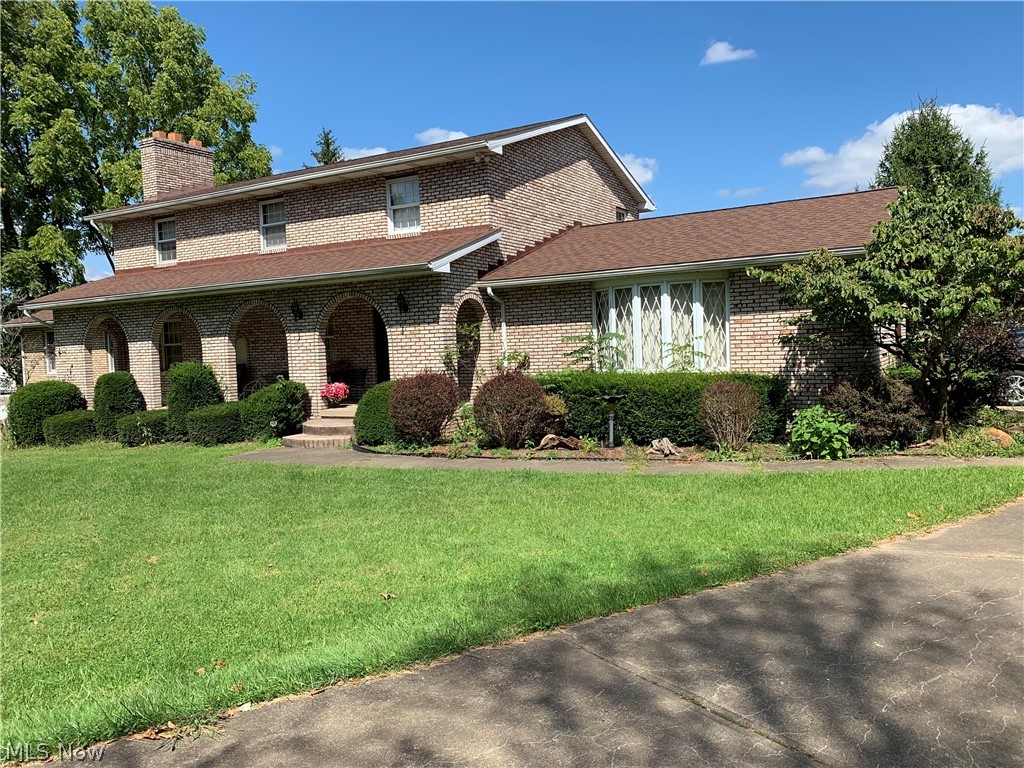 A magnificent find in Louisville School District! Over 3000 square feet on almost 1 acre in the city! This beautiful 2 story all brick home has so much to offer. You will find 4 bedrooms upstairs with 2 full baths! On the main floor not only huge living space including enormous formal living room and dining room, but also a lovely eat in kitchen with family room. But that is not all on the main floor! There is a fabulous additional living quarters complete with bedroom, full bath, closets and nice sized living room, along with french doors to deck in back yard! Lower level has full bath, family / recreation room with fireplace and good size workshop with walk out. Property is secluded and has a 3 stall storage barn and 3 car garage with extra storage! This is a must see today! It is a rare find and is waiting for you!