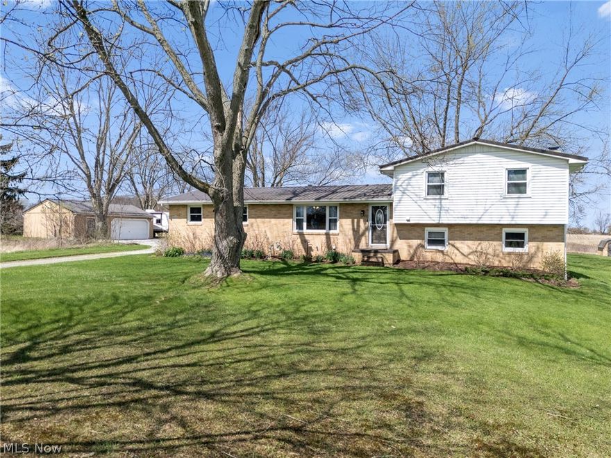 This is the kind of property that doesn’t come along often. Set on 3.38 acres, this fully updated home offers the perfect blend of space, privacy, and lifestyle. From the moment you arrive, you’ll feel it—this is more than just a house, it’s a place you can truly settle into and enjoy. Inside, the home has been thoughtfully refreshed with a bright, clean feel throughout. You’ll find 4 spacious bedrooms and 2 full bathrooms, along with a fully applianced updated kitchen that’s ready for everyday living and effortless entertaining. New windows, doors, and lighting add a modern touch while still keeping the home warm and inviting. Step outside, and everything changes. The property opens up to a setting that feels peaceful, private, and just a little bit magical. A stunning .75 acre pond sits at the heart of it all—fully stocked, swimmable, and complete with a dock—creating a space that’s just as perfect for quiet mornings as it is for hosting friends and family. The sunsets here are incredible, and the wildlife that visits regularly only adds to the experience. Surrounded by mature trees including apple, elderberry, blackberry, and chestnut, the land offers a natural, almost homestead-style feel. With outdoor electric set up for RV hookup, hot tub, and entertaining areas, the possibilities here are endless. The property also features both an attached garage and a large detached garage—ideal for extra storage, hobbies, or anyone needing additional space beyond the everyday. Major updates have already been taken care of, including a newer roof, windows, electrical panel, well system components, and more—giving the next owner peace of mind from day one. If you’ve been searching for something updated, unique, and set on beautiful land with a view you’ll never get tired of… this is it.