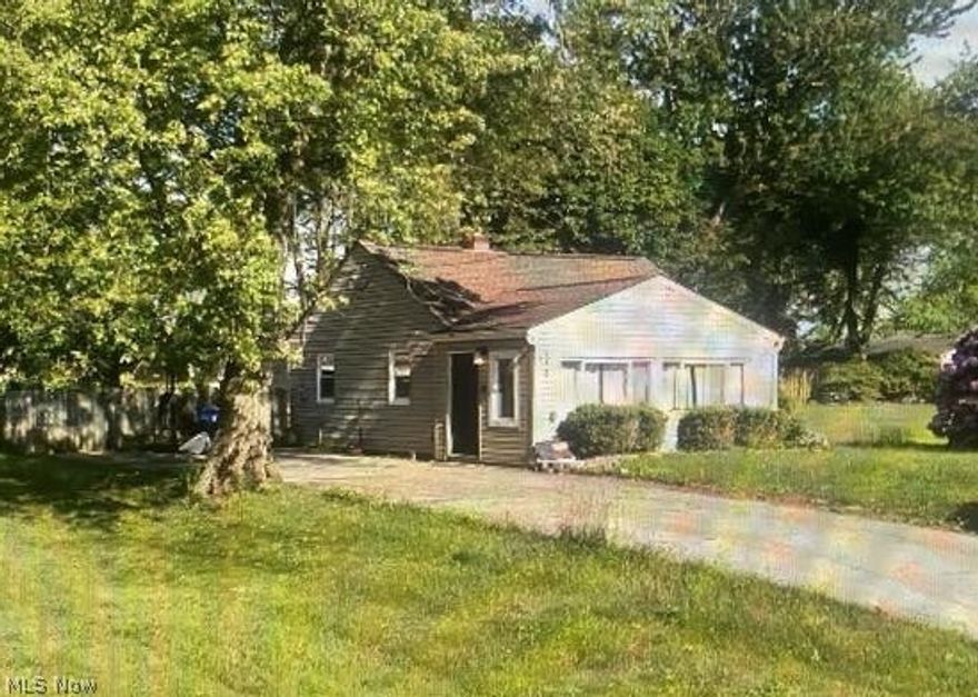 Sold before Print!  Investors welcome! Home needs TLC, close to Portage Lakes.