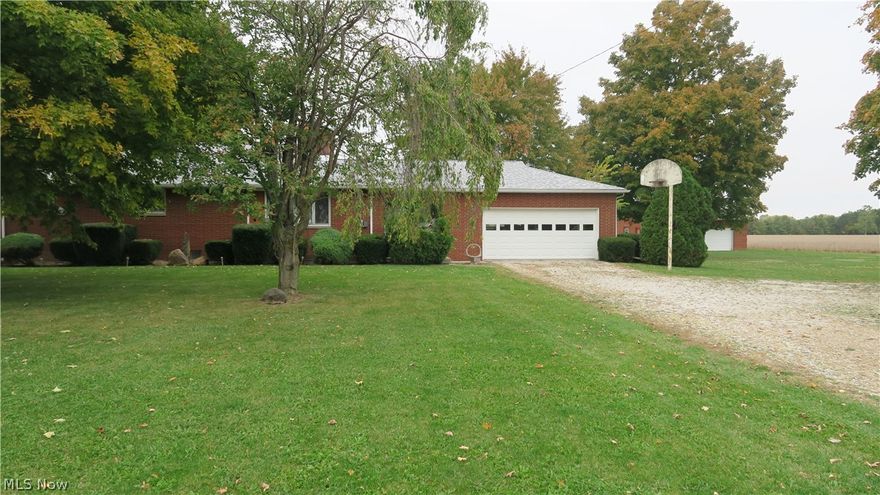 A lovely well-built country ranch brick home located on almost 1.5 acres just outside of town!  This 3-bedroom cozy charmer has a fireplace on the main level and the basement. All the bedrooms have wood floors and cedar lined closets. There is 1.5 bathrooms with the full bathroom having large built in cabinets.  Attached is a two-car garage and a 4 seasons room to enjoy your morning coffee! There is also a detached brick garage (24ft x 32ft) and a full basement to potentially finish. New roof 2020.

Third party septic inspection and repairs have been completed 2020.