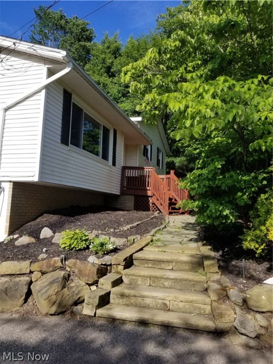 Are you looking for a home surrounded by peace and serenity? Look at this great 3/4 spacious home on 1.33 acres.  This home sits on a small street, with your own private pond, sun room, partially fenced private yard, 2 car attached garage & 24x24 building with electric, work bench, 12ft door, shed & deck?  This is the home for you.  This 4 level split greets you w/a spacious living rm that opens to the dinette & updated kitchen w/solid surface counter tops, appliances, breakfast bar & counter space galore.  French doors lead you to the sun room, that  overlooks the private pond, yard & building.  The upper level boasts hardwood flrs on the stairs & hallway, 3 bdrms & a full newer ba.  Enjoy the cozy fall & winter days in the LL family rm w/wood burning stove.  The laundry rm, full ba and utility rm complete this level.  3 steps down provide a 4th bdrm/office and storage space along with access to the over sized 2 car garage.  The interior has a fresh coat of paint throughout.  The home