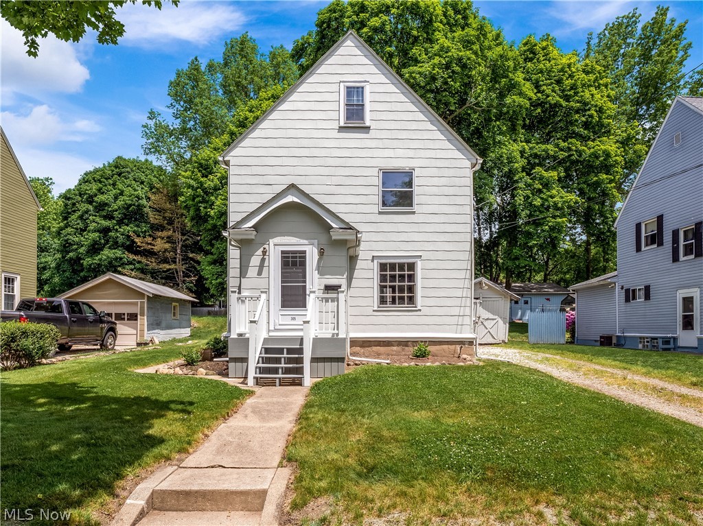 Charming century home in the heart of Kent just blocks from Roosevelt and Stanton Middle schools and vibrant downtown Kent and KSU! Located on a quiet dead end street, this well-maintained home beams with pride of home-ownership. The light and bright main level has large and plentiful windows that highlight the original wood details and let in loads of natural light throughout the living and dining rooms and the cozy kitchen. Upstairs are 3 nicely sized bedrooms and a full bath. The full basement is clean and dry and provides plentiful storage and hookups for washer and dryer. HUGE unfinished attic space with tall ceilings could be finished for additional living space. A private and shaded backyard is the perfect spot to entertain guests or enjoy a quiet retreat. Water line was completely replaced in July 2021. All carpet was replaced in 2019 as was the front door, porch, and steps. Additional updates include newer flooring in foyer and landing to basement, some interior paint, and a f