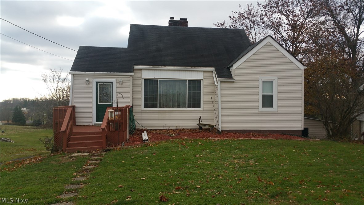 Completely remodeled 3 bedroom 2 bathroom cape cod style home on just over 2 acres! Don't miss your opportunity to own this updated, lovely home! Brand new paint throughout most of home and newly finished hardwood floors & new bathroom floor! 1st floor features a beautiful eat-in kitchen w/ luxury LVT tile & sliding glass door leading to large deck with plenty of room to relax, grill & lots of entertaining; kitchen has GREAT u-shape design in oak cabinetry w/ built in appliances, side by side refrigerator, dishwasher, oven, cook top & microwave all in black with serving peninsula, great for entertaining; spacious living room w/ beautiful newly refinished hardwood floors, fireplace, large window for natural light, 2 bedrooms & full bathroom on the 1st floor with bonus 2nd level featuring large bedroom. Basement includes newer bathroom w/ shower. Main entry is a room of its own that can be used as a computer room or mud room or home office or reading room! Newer roof, windows & siding a