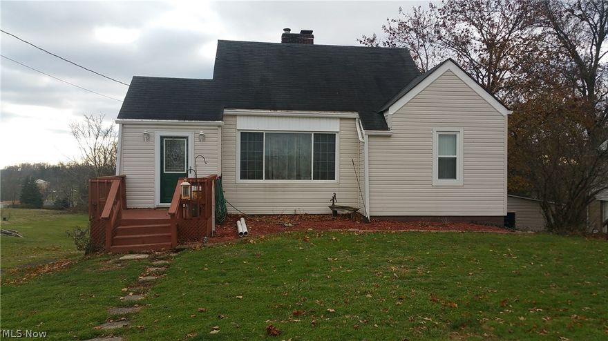 Completely remodeled 3 bedroom 2 bathroom cape cod style home on just over 2 acres! Don't miss your opportunity to own this updated, lovely home! Brand new paint throughout most of home and newly finished hardwood floors & new bathroom floor! 1st floor features a beautiful eat-in kitchen w/ luxury LVT tile & sliding glass door leading to large deck with plenty of room to relax, grill & lots of entertaining; kitchen has GREAT u-shape design in oak cabinetry w/ built in appliances, side by side refrigerator, dishwasher, oven, cook top & microwave all in black with serving peninsula, great for entertaining; spacious living room w/ beautiful newly refinished hardwood floors, fireplace, large window for natural light, 2 bedrooms & full bathroom on the 1st floor with bonus  2nd level featuring large bedroom. Basement includes newer bathroom w/ shower. Main entry is a room of its own that can be used as a computer room or mud room or home office or reading room! Newer roof, windows & siding a
