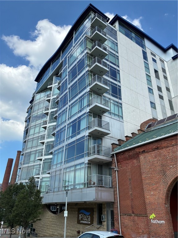 Discover this beautiful 2-bedroom, 2-bath condo offering breathtaking downtown views at The Plaza. Features include a large great room with wood laminate floors, large balcony with downtown views, island kitchen with granite counters, granite floor tile, unique maple cabinets with drawers and flip up doors, all appliances, large owners suite with dressing area, walk in closet and ensuite bathroom with walk in tile shower. The second bedroom with floor to ceiling windows and downtown views can also be the perfect space for a home office. An indoor gated parking space rounds out this condos many benefits. The Plaza is currently undergoing a beautiful lobby renovation. If you have been here previously you won't recognize it. Two exercise rooms were recently completed and there is direct access from the building to the Superior Viaduct. Walkability is key here with many restaurants and music venues just a block away. Also walkable is Downtown, Ohio City and the Flats East Bank. Walk/bike to Edgewater Park and Whiskey Island via the Towpath and Lakefront Bikeways. Easy access to public transit and all major freeways leading to University Circle, Tremont, Gordon Square, Steelyard Commons and the airport.
