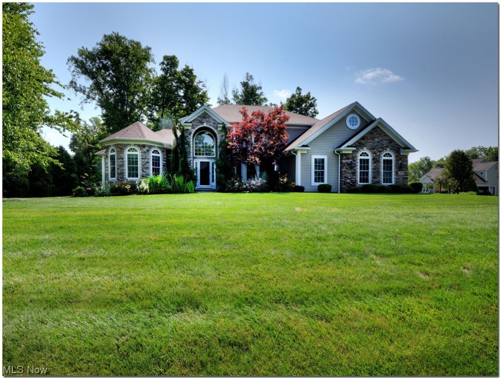 Welcome to this gorgeous custom home built by LDA Builders. Step into the 2 story foyer with beautiful epoxy flooring and a grand staircase leading to the 2nd floor. The open floor plan with a two-story great room with a gas fireplace leads you to an open kitchen with an island and all new SS appliances (2022), all built-in, including a wall oven with an air fryer, microwave, cooktop, and refrigerator. Walk in pantry and laundry are just off the kitchen area. A morning room off of the kitchen is a great place to sit for morning coffees and opens to the outdoor patio. A formal dining room with a tray ceiling finishes the open floor plan. The 1st floor master bedroom is what dreams are made of with two walk-in closets and a private sitting area or office. The master bath has a jetted tub and a walk-in shower. Upstairs there are 3 more bedrooms that share another full bath. Guest bathrooms have epoxy flooring and counters. The lower level is finished with a wet bar, epoxy flooring and car