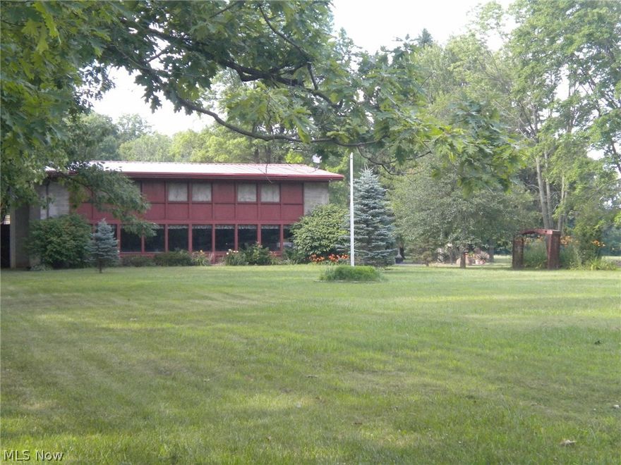 Have you been looking for a secluded and wooded acreage retreat with the ambience of a "HOCKING HILLS" in Mahoning County?  Look no further!  Formerly know as Camp Millwood, a Girl Scout Campground, this real estate offering consists of 9 contiguous parcels of land totaling 66.83.  There is the owners 3 bedroom house, a 3 bedroom ranch house with attached 2 car garage which has rental income,  a 4468 sq. ft. two level lodge with commercial kitchen, several other outbuildings last used for club meeting houses and maintenance equipment storage.  Best of all there is FREE NATURAL GAS to all buildings from current gas well leases.  There are trails through the woods and paths leading to the North Fork Creek that meanders through the property.  Creek bed stone walls add to the pristine woods and the experience of the "great outdoors.  This property is being offered at public auction with online, internet bidding to all registered bidders.  TERMS:  Opening required bid is $250,000 + a 13% buyers premium with the auction closing on Wed., July 26, at 6:30pm.  A non-refundable down payment of $35,000 is required from the successful bidder, to be paid within 24 hours by cash, Certified Bank Check, or wire transfer to American Real Estate Specialists trust account on Thurs., July 27th, 2017.  There will be several scheduled times for the public to preview the property.  Watch listing brokers website for preview dates and times.  Any repairs to septic systems will be at buyers expense.