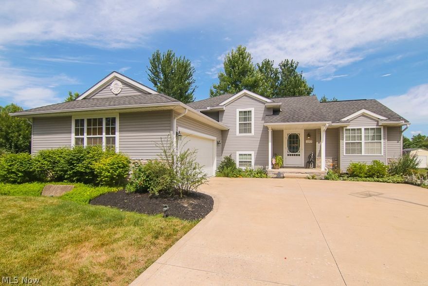 Welcome Home to this Four Bedroom, Three bath , 4 Level Split home, Located in Grafton!  This home has been freshly updated with an open Main Floor, White Kitchen Cabinets with an Island with Granite Counter updated in 2017! Other kitchen updates include A Ship Lathe Back splash and Stainless Appliances . The Main Living Areas , Living room , dining Room and Kitchen, all have Hardwood floors adding continuity to the open floor plan of the main Level. The Lower Level Has Been Finished with a Family room, second dining/game area . A second Master Bedroom and Full Bath With fresh Ceramic and Updated ,Stylish Vanity with plenty of storage finish out the Lower Level.  The Upper Level Has a Master Bedroom with 2 Closets and updated Master Bath.  Two more Bedrooms with hard wood floors and a third Freshly renovated full bath Finish out the Second Floor. Outside the sliding doors of the dining room is a spacious deck, Perfect for Entertaining and a lower level patio area. Privacy screens have