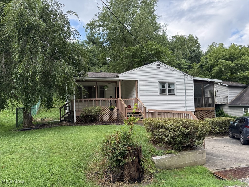 If you are looking for a place to plant your roots, then look no further! Tucked away on a peaceful street in Southside Parkersburg, this home has loads of potential. The finished basement offers plenty of space for storage or family activities, while the upstairs is warm and welcoming to all who enter. The side porch offers a great spot to enjoy a cup of coffee in the morning, read a book, or just relax and listen to the birds sing. The original hardwood floors offer a beautiful touch to the home that is already filled with charm. Schedule a showing today and let's make this home your little piece of heaven!