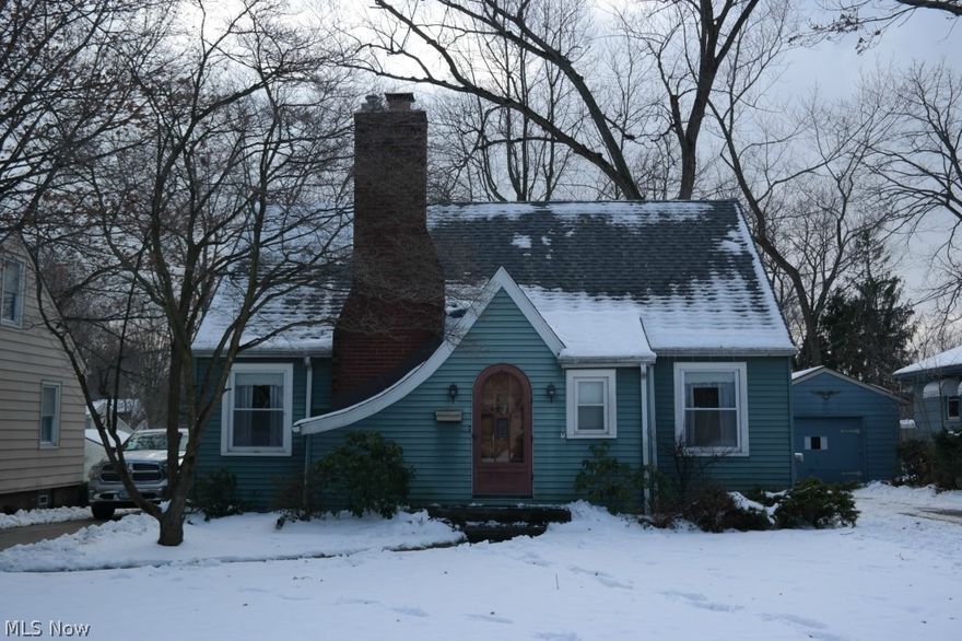 Lets start this year out in a home where all that is needed is a new owner ! This home has several updates including newer roof, windows and lets not forget the new carpet. Property has three bedrooms with two being on main level and one large upstairs with a sitting room or office. For the man of the house is a large two car garage with electric and a yard to hold the block football games. You will notice immediately this home was built with a high regard on quality from the plaster walls, to the oak floors all the way down to the stunning hand carved arched wood screen and entry doors which will truly bring back the memory of when things were built on quality rather then quantity!! Welcome Home