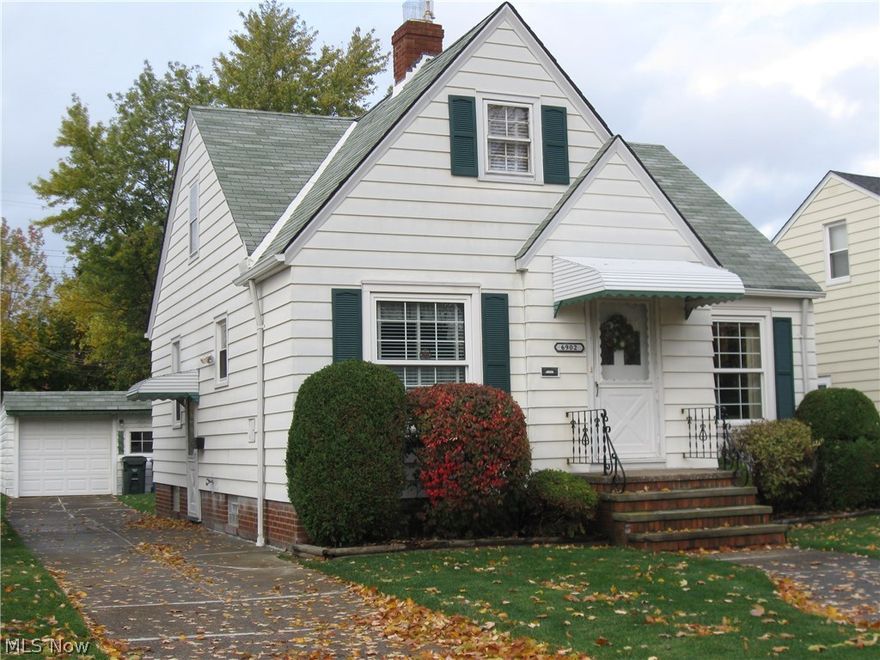 Complete with those special finishes from this by-gone era, such as original hardwood floors, authentic knotty-pine, unique archways, cove ceilings, & built-in cabinetry, this ONE-OWNER charming bungalow sheltered a family of 5 for decades and is ready for a new family to call it home! Cozy front entrance with coat closet; family-size, freshly painted LR with hardwood that is like new; ample kitchen dinette with built-in cabinets; 2 first-flr BR's; large 2nd floor finished dormer offers 2 sizable closets+built in storage. Extra upstairs bonus room could be used for a nursery, homework/study area, office, or craft/sewing room and is NOT included in BR count. Updated electrical boxes w/new 100 amp service. Design your own future basement rec room for extra living space. W&D, frig,dishwasher and range included. Updated high-effic. gas furnace & C/A. HOME WARRANTY offered by sellers for buyer's peace of mind. Much potential for an affordable price on nice street conveniently located off Ri