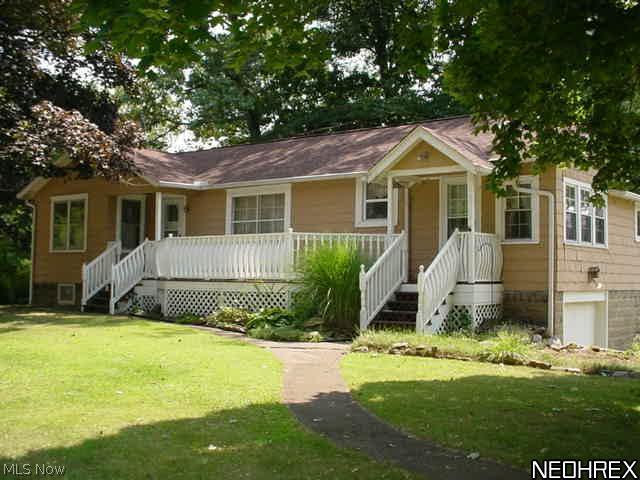 Seller just put $2000 and lots of work into this house, Oct 2014! Bedrooms new drywall, new paint everywhere and new carpet! Great 2 bed on large 4 parcels,(3/4 acre) basement and 1 car garage under! 2002 new well, 2006 new roof, 2009 most windows! Hardwood floors! Lg living & formal dining! Breakfast nook! Walk to lake! Beds are small. Updated electric, blown insulation. Cute, ready to move in!