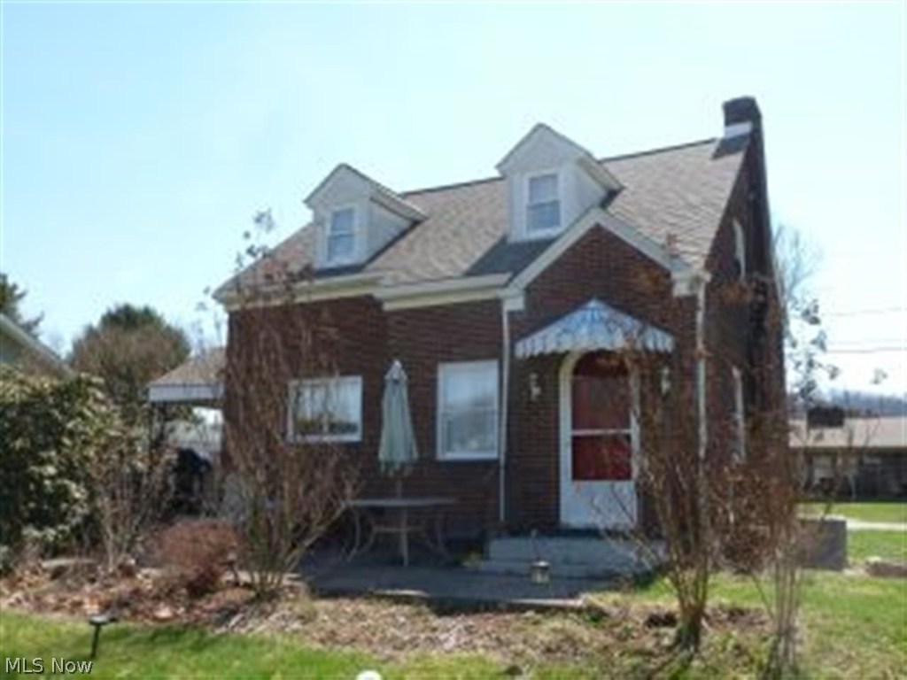 Updated very cute 1 1/2 story brick home with 3 bedrooms and 1 1/2 baths. Many, many updates to this home. Bathroom has ceramic tile on floor, surround tub, and half of walls. Half bath is located in the basement along with bedroom 3. Nice sized rooms. Nicely landscaped with pond in backyard. Above ground pool with deck will be left. Garage was converted to storage area with patio doors, but can be converted back to garage doors.