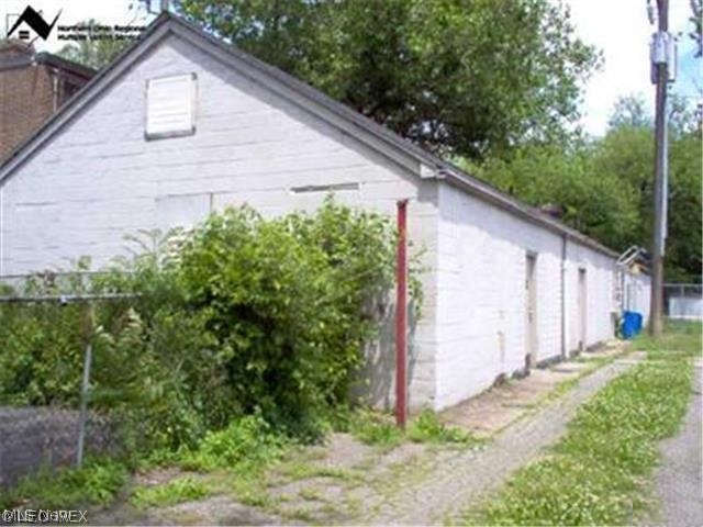 Large, one floor cinder block building, waiting for your commercial use. Close to EcoVillage and Ohio City. Could be a studio and/or could be a welding shop, etc. Full bathroom with shower. Large, full attic for storage. Grass/yard area behind building. Fenced. May even be possible to convert to residential use as the property abuts residential homes (check with the City of Cleveland). Current zoning is Light Industrial. Was a furniture refinishing and stripping business (equipment for that business available for $10,000.).
