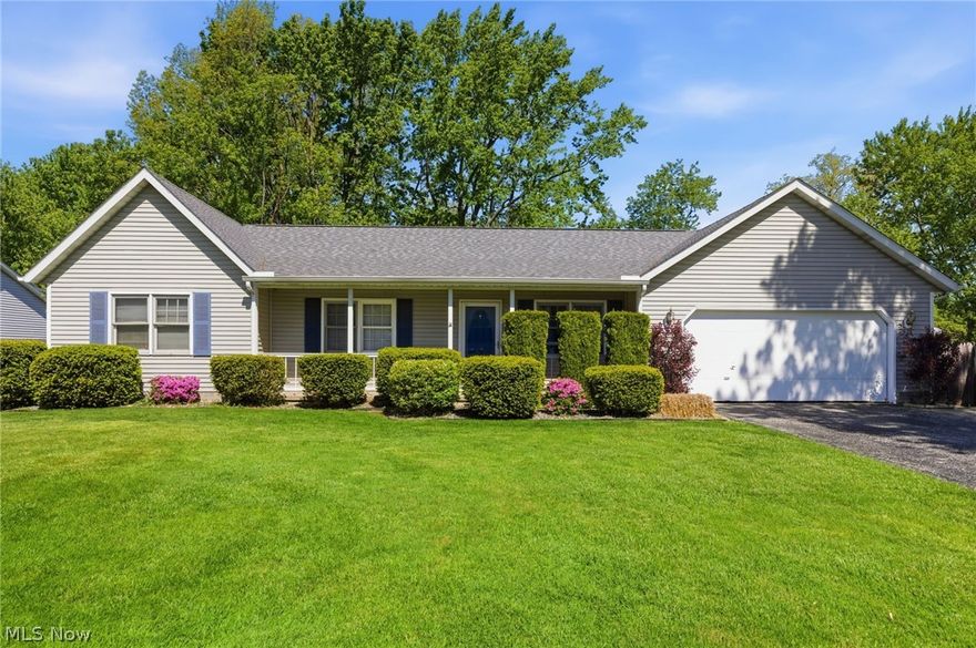 Welcome to this wonderful single-floor home nestled in desirable Painesville Township, just minutes from shopping, parks, Lake Erie, and convenient freeway access for easy commuting and travel. As you approach the front entrance, you’re welcomed by a charming front porch — the perfect spot to relax and enjoy your morning coffee or unwind at the end of the day. Step inside to a spacious living room highlighted by vaulted ceilings and an open, airy feel that flows seamlessly into the dining area and kitchen, creating an ideal space for entertaining guests or enjoying cozy nights at home. Just off the kitchen, you’ll find a convenient laundry room with direct access to the attached two-car garage. Down the hallway are three generously sized bedrooms and a full main bathroom. The primary suite features its own private en-suite bathroom and a walk-in closet, offering comfort and functionality. From the dining room, step into the screened-in porch overlooking the expansive fenced-in backyard — a great space for outdoor gatherings, pets, play, or simply enjoying the outdoors in privacy. This home is full of potential and ready for your personal touches and lasting memories. Don’t miss your opportunity to make it your own — schedule your private showing today!