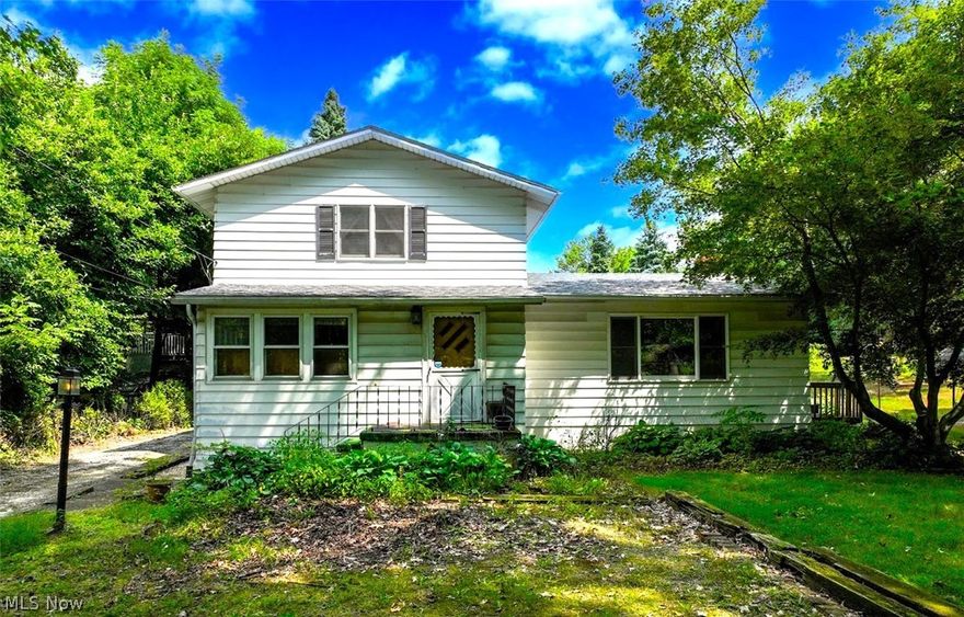 *Calling All INVESTORS, Here Is Your Next Project In A GREAT AREA!! *Colonial Featuring 1,811 Sq. Ft. Above Grade Including 3 Bdrms, 2 FULL Bathrms + 450 Sq. Ft. Partial Fin. Basement & A 2 Car Detached Garage on 2.91 ACRES OF LAND In Green Local School District! *Outbuilding + Covered Patio/Gazebo W/Fireplace *Updates Includes: NEW ROOF on Home, Garage And Outbuilding 2023, 2 NEW Oil Heat FURNACES <5 Yrs Old!! *This Home Boasts A FIRST FLOOR MASTER BDRM W/ENSUITE FULL BATHROOM *Walk In To A Foyer W/Coat Closet & Double Bifold Doors *Dedicated Office/Den W/Walls Of Windows *Step Into The Main Living Rm W/Ceiling Fan Open To FORMAL DINING W/Bay Window & Chandelier *1st Floor FULL Bathrm W/Tub & Deep Built In Linen Closet *Kitchen W/New Stainless Steel Refrigerator, Tile Backsplash & Exit/Entry Door From The Back Yard! *To The East Of The Home On The 1st Floor, Which Also Has An Interior Door To Close It Off, Is A Family Rm W/Coat Closet And 1st FLOOR MASTER BDRM W/Ensuite Full MASTER BATHRM & It's Own Exit/Entrance Door! *This Side Can Be Used As Normal, Enhancing And Expanding The Main Floor Living Space & Utilizing A Family Rm AND Living Rm OR Would Be Great As An In-Law Suite To Place Mom & Dad, Grandparents Etc On Their Own Little Side ~ You Choose! *Upstairs Are 2 GENEROUS Size Bedrooms W/Carpet --> One Being 20 Sq. Ft Long & The Other W/Dual Lighting 21 Sq. Ft Long *Walk Downstairs To The Basement. To The West Is A Recreation Room W/Epoxy Painted Floor, Built In Corner Seating Bench & Wood Burning Fireplace To Re-do And Make It Your Own! On The Other Side Is Another Small Sitting Rm If Wanted, Canning Room/Cellar & Laundry Rm *One Owner Home *The 2.91 Acres Backs Up Near The Old Regal Cinema On Interstate Parkway In Green *Priced Exactly At County Assessed Value *This Property Needs Work & Is Ready For Someone To Bring This Beauty Back To Life! CASH ONLY / AS IS. Sewer Available @ The Street *Zoned B1, Residential or Business Use!! *Live Video Walk Through Tour