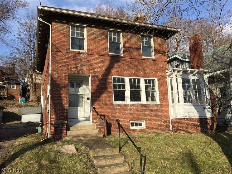 We have priced this home to sell in the historical district on McIntire Ave. You get 3 bedrooms 1 is very large with a fireplace to decorate. Hardwood floors still exposed in the bedrooms. The downstairs has a dining area, large living area and a nice sunroom. Over 1400 sq. ft. of living space. Most of the original glass pain doors are still there. Home has a storage shed in back, gas heat, central air. Step back in time in this well kept historical home. Being centrally located in the Zanesville area you are minutes from it all.