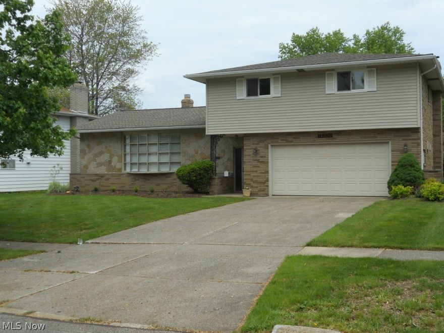 Large Split & Original Owners Have Moved On. 2100 Square Feet With Generous Room Sizes. Formal Living Room, Dining Room & Family Room With Fireplace. Also Rec Room In Semi-Finished Basement. Updated Kitchen Cabinetry & PLENTY With Counter Top Gas Stove. Enormous Master Bedroom With 3 Closets & Full Bath-Shower. 2 Other Bedrooms 12x12 & 12x13. Roof Tear-Off 2014, Basement Front Waterproofed 2014, All Newer Windows Except Front Window. Furnace & A/C Recently Serviced. Semi-Private Backyard With Large Open Covered Porch. Oversized 2 Car Garage.