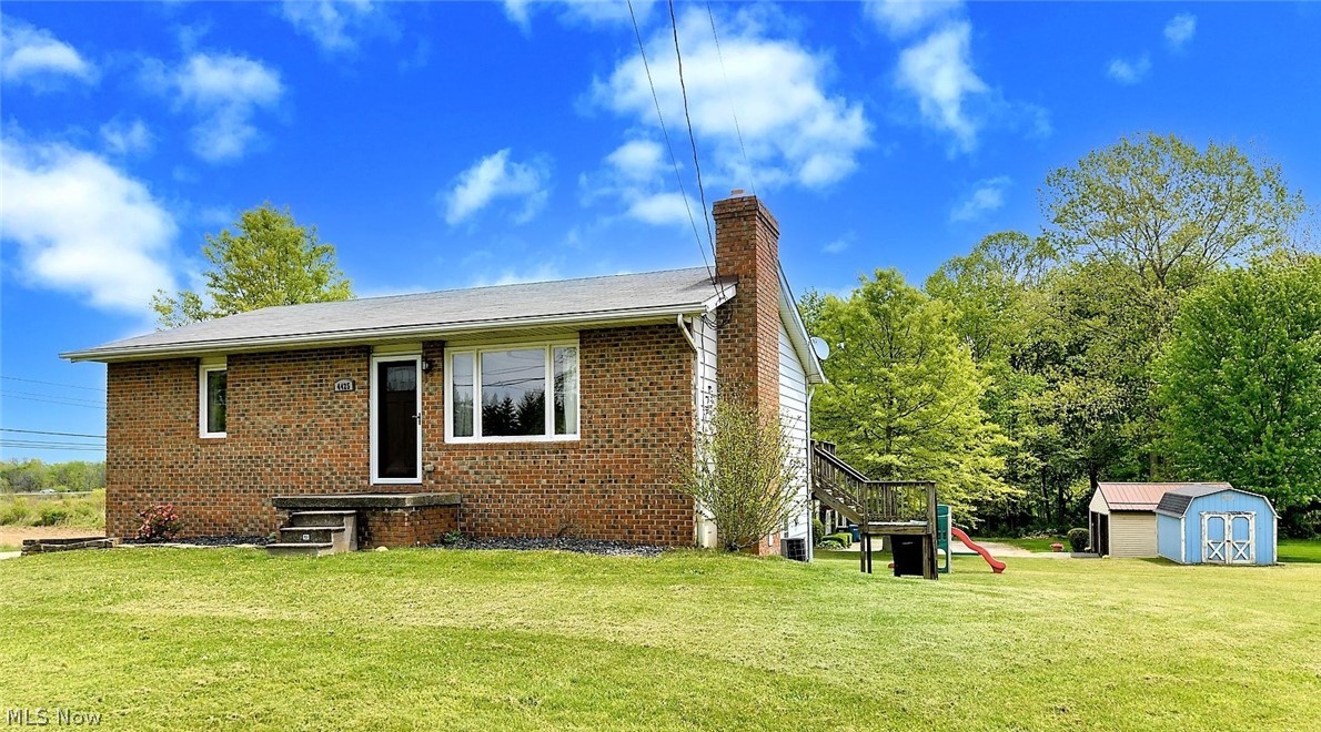 *Beautiful Raised Ranch In Green W/Walkout Basement! *2-3 Gracious Size Bedrooms, 1.5 Bathrooms & Attached Garage On An OUTSTANDING .75 ACRES!! *FINISHED Basement *New Entryway Modern Grey Tile Floor *The Living Rm Features A Fireplace W/Wall To Wall Stone Surround & Hearth! Large Picture Window *Eat In Kitchen Showcasing Ceramic Tile Flooring, Convenient PANTRY, WHITE Cabinets, Custom TILE BACKSPLASH & Is Fully Applianced With <2 Yrs. Old Upgraded Samsung Double Freezer Door Refrigerator, GAS Stove & Dishwasher! *Sliders To The Back DECK For Entertaining! *Full Main Floor Bathroom W/Ceramic Tile Flooring Provides Great Space W/Modern Grey Accent Walls, 4 Sconce Lighting & Moen Faucet *Master Bdrm Showcases Soft Carpet, Double Bifold Closet Doors & Window Treatments *2nd Bedroom W/Double Windows, Double Bifold Closet Doors *Sleek Wood Stairs & Railing Land On A Modern Tiled Floor In The Basement W/Built In Seating Bench & Coat Rack Located Near The Attached Garage *Closet Hallway *1/2