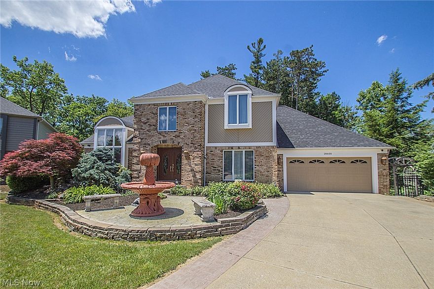 Your search for a well-appointed, luxury home ends here! Every amenity you can imagine is found in this one-of-a-kind property from marble floors in the foyer to Italian granite floors in the expansive, great room with hand painted walls. In addition to the large great room, there is a huge family room & trayed ceiling, formal living room. The kitchen employs granite counter tops, custom designed backsplash, Wolff appliances and a sub zero refrigerator/freezer & an adjacent butler's pantry that is ideally placed for entertaining. The master suite offers an amazing bathroom with a Jacuzzi tub & complete "steam" shower. The custom walk-in closet w/ built-ins measures 15' x 12'! Take the party downstairs... the lower walkout level of 2,300sq ft has a full kitchen w/ granite counters, large dining & living area w/ fireplace, full bath, exercise room and 5th bedroom. This space is perfectly suited for an inlaw suite or guest quarters! The downstairs doors provide access to the outdoor priva