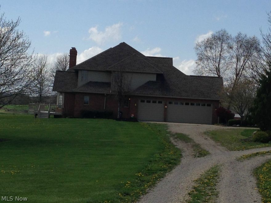 This 4664 square foot beautiful 5 bedroom 4.5 bath home is located on 15 acres with Oil and Gas rights.  This  home has great features such as custom Cherry kitchen cabinets, Cherry hardwood floors, cozy Fireplace, back deck made with exceptional craftsmanship and a full walk out basement. This Cheerful home sits with great views and also provides privacy.  There is a large stocked pond with a small cabin close by as well as Barns and barn lots.  Additional acreage is available. Oil and gas rights are leased to Gulfport at 20% Royalty.