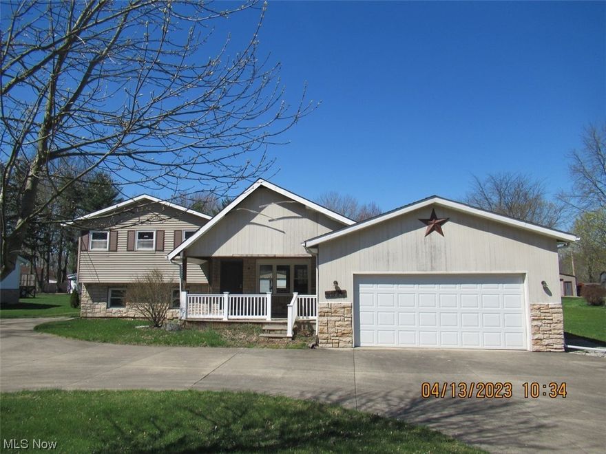 This wonderful property is looking for a new owner who is willing to provide some TLC. The split level has 3BR/1BA up, plus there is a fourth BR and full bath in the lower level. There is an attached 2-car garage, plus a large detached building that could be a work room or garage for the car enthusiast. A deck with gas grill overlooks the spacious rear yard. The home will need a new roof and there is some interior water damage, and the price reflects these necessities.