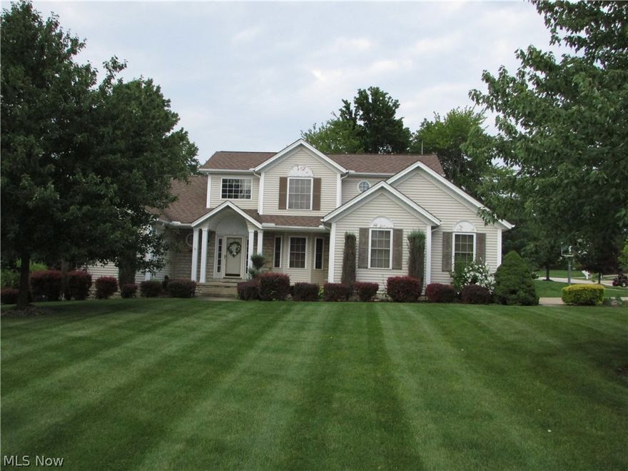 An absolutely remarkable 4, possibly 5, bedroom and 3.5 bath colonial in the desirable Rolling Hills Subdivision. There are two first floor bedrooms, and 2 full baths, including a large master suite that has entry to the rear porch/patio. A large, 2 story great room has a fireplace, and is overlooked by a loft area. A 20x15 eat in kitchen has a huge pantry, and formal dining. There is over 1000 square feet of additional living space in the basement, including a family room, rec room, additional bedroom/office, bar area, and a half bath. The back yard has a porch, beautiful stamped concrete patio, and a shed. First floor laundry, large foyer, and so much more.