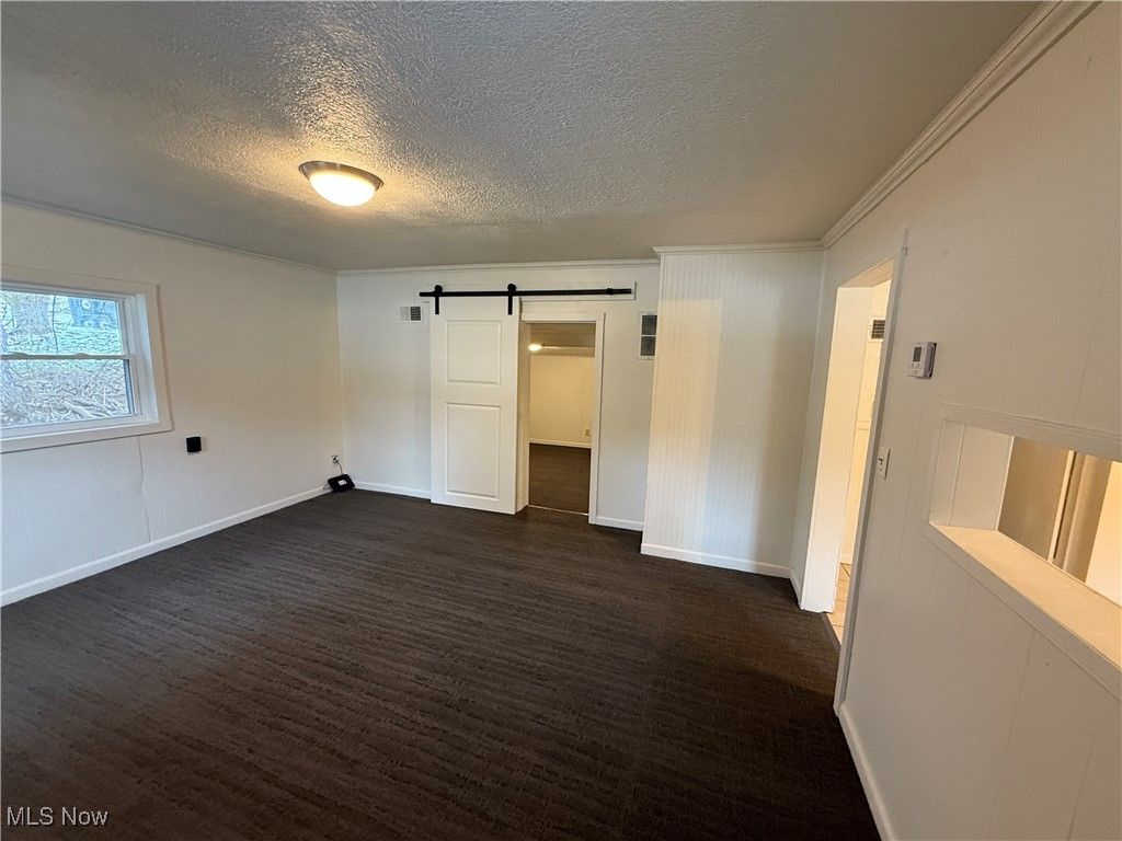 Photo of 604 Crider Avenue NE, New Philadelphia, OH 44663 (MLS # 5176094)