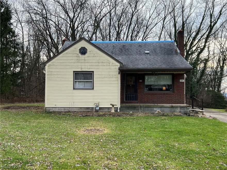 3bedroom, 1.5 bath cape cod in Struthers Schools. Walking in you will notice newer laminate floors stretching from the living room into the kitchen. Two first floor bedrooms with restored hardwood floors and decent closet space, carpeted third bedroom upstairs in the finished cape. The kitchen boasts updated white shaker cabinets, stone counter tops, and a dishwasher, refrigerator, and electric range that stay. Detached one car garage with concrete drive. High efficiency gas furnace with central air. Includes a double lot for a nicely sized yard.