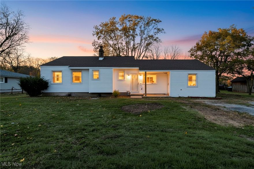 Welcome to 34918 Chestnut Ridge Rd in North Ridgeville! This renovated home sits on two parcels offering a fresh and open residence, a massive land lot, and a large barn with endless potential such as garage space, hobbies, and storage. The many recent updates include an en-suite primary bathroom, a fully updated secondary full bathroom and a dream kitchen. Additionally installed is new exterior siding, flooring throughout, recessed ceiling lighting and new light fixtures, new windows, new electrical panel, new central air!  So many amazing updates completed to make it a move-in ready!  The open-concept living, dining, and kitchen area is perfect for entertaining. Natural light pours in through the many windows, creating a bright and airy atmosphere throughout. The kitchen showcases beautiful white cabinets, subway tile backsplash, and a spacious island with seating, along with a separate dining area.  The home includes 3 bedrooms and 2.5 bathrooms, including a primary suite with a walk-in closet and private bath featuring a walk-in shower. The large basement provides abundant storage space and could easily be finished for additional living area.  Around back, you’ll find a covered patio with direct access to the living room for convenience.  Don’t miss this unique property combining updated comfort with extra land and space for possibilities!