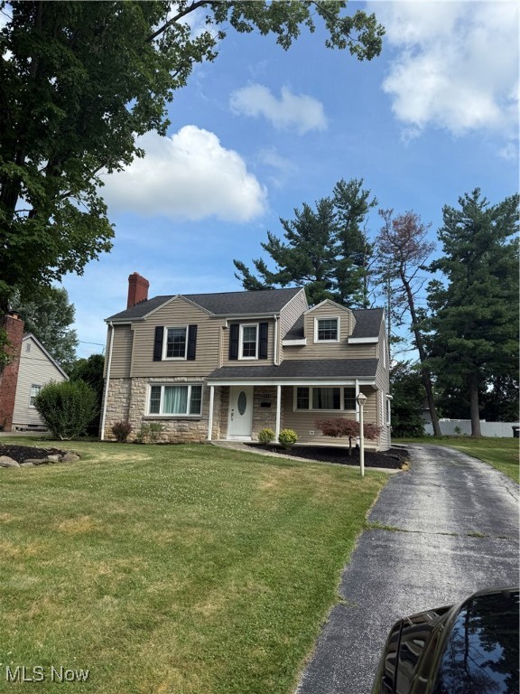 MOVE IN READY, Large eat in Kitchen with breakfast area and large island bar, formal dining room. Family room with Fireplace and 1/2 bath all on the first floor. Upstairs 3 Huge bedrooms and a full bath. Basement has an additional new full bath, rec-room and laundry 2 car attached garage, patio and covered porch. Private backyard