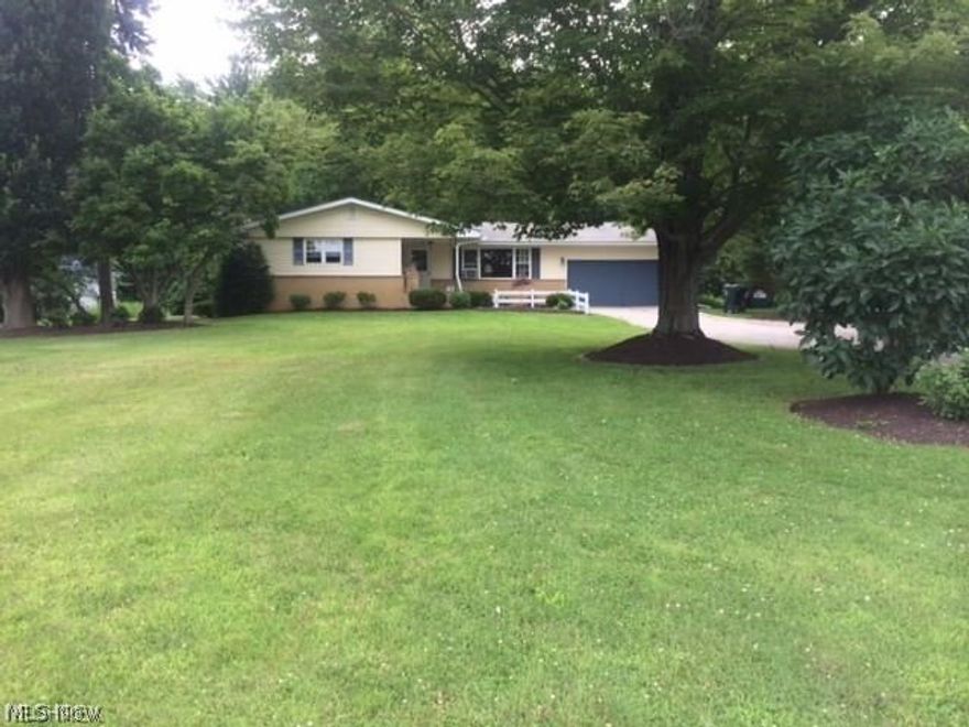 Selling as-is, where-is. 3 Bedroom & 1.5 Bath Ranch set on 1+wooded acre. Living Room with wood burning fireplace. Eat-in Kitchen. All 3 Bedrooms have hardwood floors. Wood pellet stove used for supplemental heat. Full unfinished basement. 2-car attached garage. Berkshire Schools.