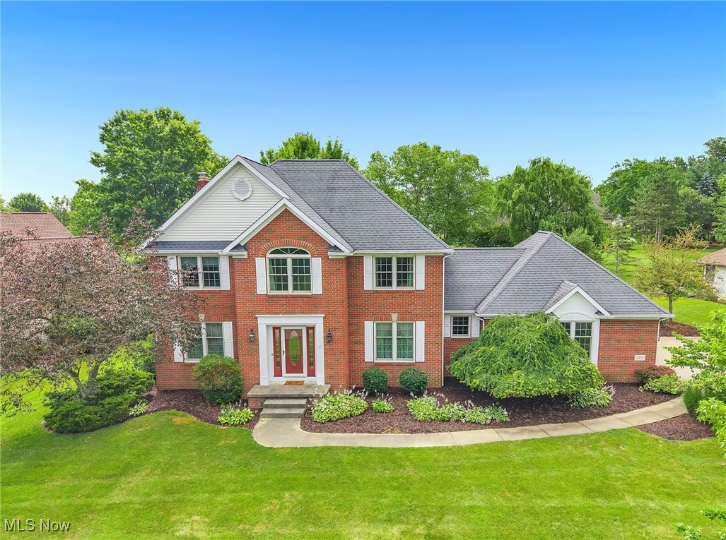 This 4-bedroom, 2.5-bathroom brick Colonial is nestled in the highly sought-after Raintree Estates. This beautiful home exudes timeless appeal with its classic design and modern amenities. As you enter the home, you'll be greeted by an open, airy foyer with stunning wood floors that flow seamlessly into the formal dining area. The dining room is a perfect space for hosting elegant dinner parties or intimate family gatherings, featuring detailed crown molding and plenty of natural light from large windows that create a warm, inviting atmosphere.
Adjacent to the dining room is a cozy living room, adorned with elegant French doors, which open into the family room, offering a seamless transition between spaces. The family room features built-in bookcases, a beautiful brick gas or could be returned to a wood-burning fireplace, and a large bay window that overlooks your private backyard retreat, complete with a koi pond, expansive deck, and charming gazebo —perfect for relaxing or hosting family and friends. The large eat in kitchen features stainless steel appliances, granite countertops and a breakfast bar.
The master bedroom suite is a true sanctuary. With soaring cathedral ceilings that elevate the space, it also includes a generous walk-in closet and a luxurious en-suite bath. Pamper yourself with dual vanities, a deep jetted tub, and a separate shower, providing the ultimate in relaxation and convenience.
For added functionality, there is a first-floor laundry room. Located in the top-rated Green Local School District, this home offers access to exceptional educational opportunities.. A three-car garage provides plenty of space for vehicles and storage, while the unfinished basement is ready for your creative touch. Furnace A/C 2019. Anderson windows 2018.
Don’t miss the opportunity to own this beautiful home in one of the area’s most desirable neighborhoods. Schedule your private tour today!