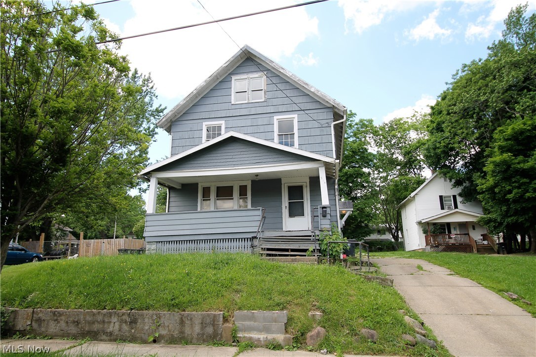 Investors wanted! Five bedroom dream home. Endless possibilities! Large living room, built in shelves around fireplace, dining room, kitchen. First floor laundry room and half bathroom. Needs TLC. Three bedrooms and full bath upstairs. Exceptional bonus the third level has two more bedrooms. Large backyard. Use your imagination.