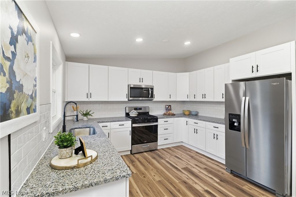 Photo of 8621 Morrilton Cir NW Cir, North Canton, OH 44720 (MLS # 5202478)