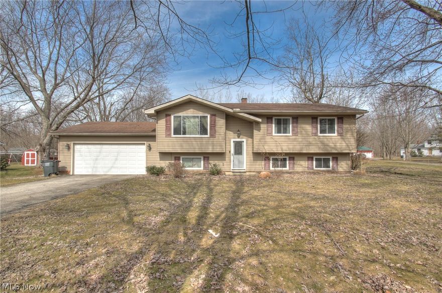 Welcome to this beautiful home located in Perry Twp./Perry Schools. Spacious rooms with 2021 Utility room flooring replaced, 2021 lower level carpeting, newer flooring upstairs & paint throughout. Kitchen remodeled 2015. Large deck off of the sunroom makes it perfect for family gatherings. Lower level has a large family room,4th bedroom & or roomy office space. Lots of fabulous options with this home. You will fall in love with the large laundry room that has plenty of storage & space to wash, dry & sort your clothes. Located close to Vrooman Rd. Bridge & Direct Access to I90, & close to Rt 2.