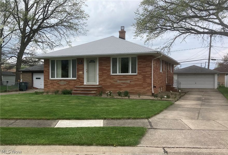 Welcome to this immaculate brick ranch located on a quiet cul-de-sac street. This 3 bedroom, 1.5 bath ranch home offers tons of natural light and gorgeous original hardwood floors, spacious kitchen with tons of cabinets and counter space.   All kitchen appliances stay. The living room and dining rooms are carpeted and have large bay windows. The large partially finished basement includes and entertainment area, laundry and storage areas with glass block windows.  Large two car garage with private back yard. Updates include waterproofing 2019, roof 2021, electrical panel 2024, masonry work 2025, plumbing 2025 and painting throughout the home. Located  near schools, parks, shopping and highways.