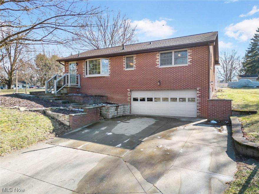 Welcome home to 1364 Willowood Drive, located in Suffield and the Field local school district. Situated on a private cul de sac you’re welcomed home with great curb appeal and landscape. As you enter into the home you’re greeted with an abundance of nature light from the large bay window into your formal dining room that leads you into the eat-in kitchen. The kitchen features stainless steel appliances, solid surface countertops, a beautiful shiplap wall and amble storage. Down the hall you will find three spacious bedrooms; a completely remodeled nursey, the master bedroom and a third bedroom currently used as a home office. The bathroom has recently remodeled with double sinks, a tiled shower with glass door, and custom cabinetry vanity. Off the eat-in kitchen step down into your cozy living room featuring a large fireplace that could be converted to wood burning with wood beam mantle. Step outside the double doors from the living room to your own outdoor oasis and enjoy crisp mornings sipping your coffee on your private patio overlooking the large backyard. The lower level features a finished rec room with built in desk and storage as well as the second bathroom. Plenty of storage in the laundry area is also in the lower level. This home has so much to offer and is a must see and is sure not to last!