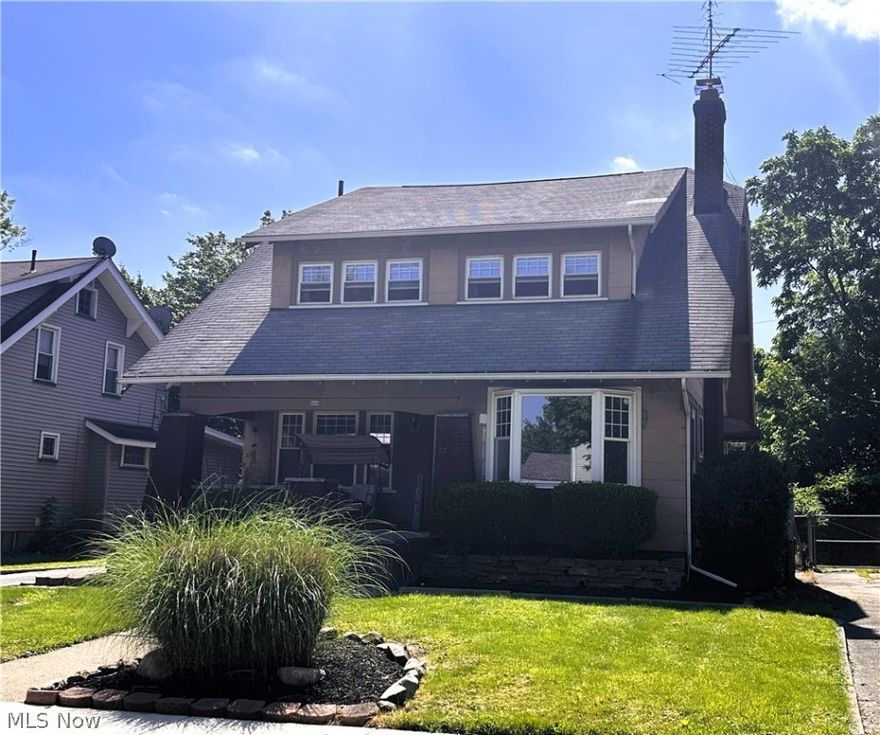 If you're looking for a space, here it is, at 2036 sq. ft.  This 2 story has beautiful woodwork and doors.  The first floor features a massive living room and dining room.  The kitchen has a breakfast nook.  There is a first floor bedroom which can be a family room, den, office or toy room.  Upstairs are 4 large bedrooms each with walk-in closets and a full bath.  These is a 2nd bath in the basement.  Lots of fresh paint thru-out and some new carpet.  Last few years: vinyl tilt-in windows,  hot water tank, and furnace.  Back of house roof as well.  Lots of other updates as well.  Fenced in back yard and a 2 car garage.