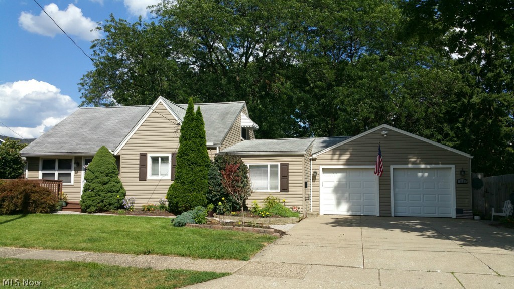 Stunning 3 bedroom, 1.5 bath home with super sized 2 car attached garage! Enjoy living room, large kitchen, huge family room with french doors to large deck. Home sits on fully fenced double lot, beautifully landscaped. Huge deck, paver patio and recently painted shed. Many updates to include newer HVAC, electric panel, appliances, siding, windows, flooring, fresh paint and more. Plenty of storage. Generous room sizes. Close to parks, playground, dining, shopping. Quick highway access too. Wonderful neighborhood. Make this YOUR new home today!