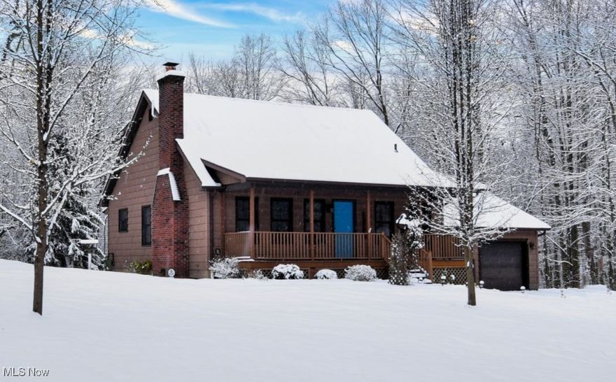 Discover peaceful country charm just minutes from highways, restaurants, retail, and the waterfront. Nestled on 6.94 private acres, this inviting 3-bedroom, 2-bath home sits approximately 1,100 feet off the road and is accessed by a full concrete driveway with turn-around for convenience and privacy.

Step inside to a warm and open layout featuring a vaulted-ceiling living room with a stunning view of the second-floor balcony. The kitchen offers Corian countertops, a ceramic tile backsplash, and seamless flow into the dining area, perfect for everyday living and entertaining. Enjoy natural light year-round in the beautiful sunroom, highlighted by its natural skylighting.

The partially finished basement provides additional living or recreational space and includes a walkout directly into the garage. Outdoor living is exceptional with a full front composite porch and a back composite deck overlooking the peaceful backyard.

The property also features a 1/8-acre pond with a dry hydrant, ideal for added safety and scenic enjoyment. Exterior highlights include vinyl cedar shake siding, city water, and a septic system.

A rare blend of privacy, convenience, and charm. this home offers the best of both worlds. Don?t miss your chance to make it yours!