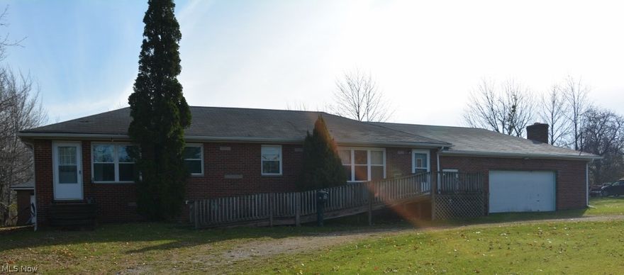 One owner brick ranch on 2 acres!  Hinckley Twp, Brunswick schools.  Explore the possibilities in this solid home.  Previous tailoring shop with separate entrance and 1/2 bath would make an expanded Master Suite, separate living quarters or suitable for an in home business office.  Attached 3 car garage set up for possible woodburner or fireplace, originally intended as a spacious family room off kitchen.  Detached 4+ brick garage for all the toys, man cave or business use.  High traffic location with nice family yard space affords the potential for multiple uses.  Convenient to I71 mid way between Brunswick and Strongsville.  Move in ready, fully applianced, handicapped accessible with original stairs under ramps.  Circle drive for easy ingress/egress. Updates include windows and doors (approximately 2010), 90% eff. furnace (2013), soffits (2013), 2007 updated interior (kitchen and bath) added handicap accessibility (from garage and front door, original steps remain)  Basement waterpr