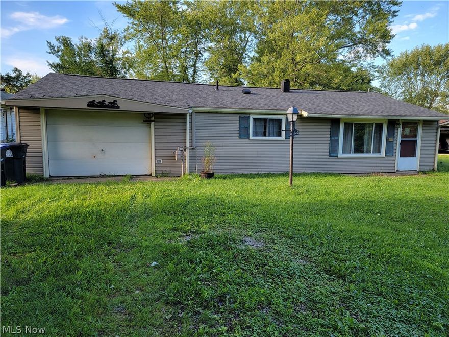 Brunswick ranch on 1/2 an acre!  Great back yard that is ready for you to enjoy.  This house has a newer roof and siding and a 3 season room. Extra deep and over-sized 1 car attached garage.