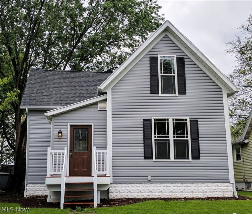 Updates include roof, siding, windows, spouting, electrical, plumbing, interior/exterior doors, new kitchen, new bathrooms, furnace, a/c, all new flooring and paint. Nothing to do here but move in! Awesome open layout fantastic for entertaining. 1st floor laundry room as well as a 1st floor master suite with a glamour bath. The foyer/mud room has a built in window seat and a closet for storage. This is not a drive by but a must see!