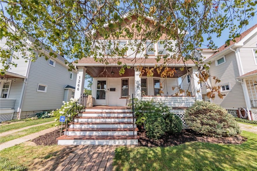 Welcome Home to this three bed, one and a half bath Craftsman Style Colonial in Downtown Lakewood, boasting timeless character and modern upgrades! Pass the inviting front porch into an elegant living room with decorative fireplace, built-in cabinetry, and beautifully restored hardwood flooring throughout the home. The dining room is the perfect place to host dinners surrounded by classic touches like original built in cabinets, window seat and stunning stained glass windows, adding a touch of historic charm. Recently updated kitchen seamlessly blends the modern and classic, featuring white 42" cabinetry, under-cabinet lighting, white quartz counters, tile floors, new stainless appliances, LED lighting, open shelving, beverage station and exposed brick!  All three bedrooms are upstairs and feature the same stunning original hardwood floors as the first level.  The generously sized primary bedroom highlights a stylish feature wall and exposed brick. A modern and updated bath rounds out this floor with classic details like subway tile, open shelving and large vanity with plenty of storage.  Outdoor entertaining is a pleasure in the large backyard surrounded by a new wood privacy fence. Plenty of greenspace and room for a firepit and garden! Newly built two car garage houses both cars and yard tools. The Unfinished but functional basement, offers tons of storage space, a half bath and a laundry area! Updates in last 5 years include: New Central Air, New Kitchen & Updated Bath, Updated Electrical Panel, New 2 Car Garage, New Privacy Fence, Refinished Hardwood Floors. Come see for yourself and enjoy the Lakewood Lifestyle, just a short walk to trendy eateries, coffee shops, bars, shopping, Edgewater, and Lakewood Park! Minutes to downtown Cleveland, sports venues, and all this vibrant area has to offer!