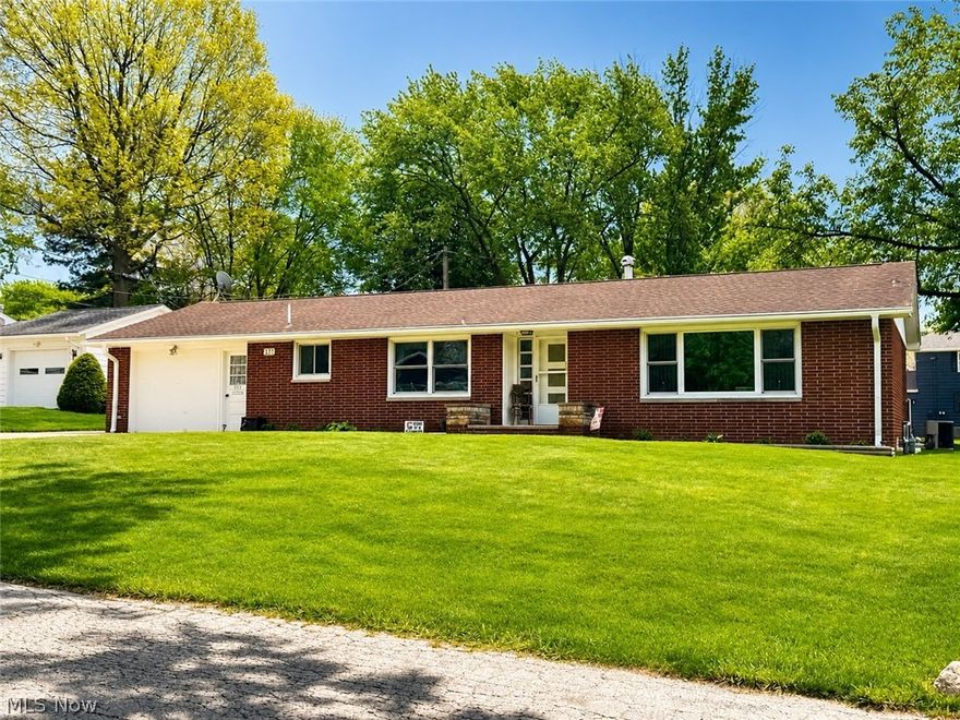 337 Bell Avenue is ready for you to call it HOME! This beautifully maintained brick ranch in the heart of Columbiana! Offering 3 bedrooms and 1 full bath on the main level, this move-in ready home combines comfort, functionality, and plenty of space inside with many built in features. The main floor holds a large and bright living room, formal dining area, and an inviting kitchen perfect for everyday living. Downstairs, the partially finished basement adds incredible bonus space with a rec room space, bar area, potential 4th bedroom or office, laundry area, and ample storage. Car enthusiasts, hobbyists, or those needing extra workspace will love the attached 1-car garage PLUS the oversized detached garage complete with loft storage above. Step outside and enjoy summer to the fullest with beautifully cared for lawn, the heated above-ground pool and spacious outdoor area ideal for relaxing or entertaining guests. Conveniently located near schools, parks, shopping, and everything Columbiana has to offer, this property delivers the perfect blend of charm, space, and versatility. The demand is high for this area and it won’t last long! Don’t miss your opportunity to make this one yours!
Gas forced air heat/central air. Appliances included gas stove, wall oven, dishwasher, refrigerator, new washer & dryer! New gutters, updated vinyl windows, painting, flooring & carpeting thru out.
