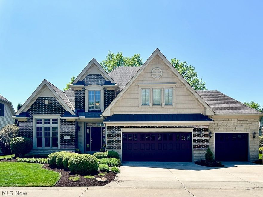 Welcome to The Grande Masters, a private gated community at Legacy Point in Avon Lake. This home is loaded with upgrades and quality craftsmanship throughout. The bright and open floor plan of this beautiful three bedroom, two and a half bath home is perfect for entertaining. As you enter the foyer on your left is a spacious office with vaulted ceiling. Adjacent to the office is a dining room with tray ceiling, crown molding and wainscoting. Notice the attention to detail with hardwood floors and 5? baseboards. The two story great room has abundant natural light, gas fireplace with a granite face and built in cabinets. The kitchen is complete with stainless steel appliances, custom cabinetry, granite countertops and a two story ceiling with windows above. A four season room has direct access to the brick paver patio overlooking the 16th tee of Legacy Golf Course with beautiful golf course and pond views. The first floor master bedroom also faces the golf course with tray ceiling and crown molding.  The master bath has a travertine vanity with double sinks, soaking tub and custom tile shower. The first floor also includes a half bath and laundry room. Upstairs is a loft overlooking the two story great room. The second level has two spacious bedrooms connected by a jack and jill bathroom. There is also a bonus room that can be utilized as a media room, second office, or exercise room.  The full unfinished basement has 9? depth and rough-in plumbing is in place should you desire to create your own finished basement. The home also has a three car garage providing ample space. A monthly HOA fee covers snow removal, landscape/lawn maintenance and irrigation. Recreation amenities are available with a swimming pool and tennis/pickleball courts in the Legacy Pointe community. Be a part of the Grande Masters experience! Many home furnishings are available for purchase.
Listing Agent is related to the sellers.