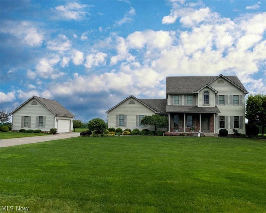 Absolutely STUNNING 3 Bedroom/2 & 1/2 Bath Colonial with a 2+ Car Attached & 2+ Car Detached Garage.  Home Features Include:  Large Living Room, AWESOME Custom Kitchen with Center Island, Pantry, Tons of Cabinet Space, Breakfast Area, & Stainless Streel Appliances, Formal Dining Room, First Floor Laundry Room, & Half Bath.  Second Floor offers a Large Master Bedroom with Walk in Closet & Master Bath.  There are 2 other large bedrooms plus a 2nd Full Bath.  The Lower Level is Finished with a Family Room Area with Gas Fireplace, Rec Room Area, Full Kitchen, & Breakfast Area.  There is also tons of storage in the furnace room.  The Sliding Glass Door off the kitchen area leads to a brick patio with views of the Private Scenic Back Yard.  The Front & Back Lawns have been Professionally Landscaped and very well maintained.