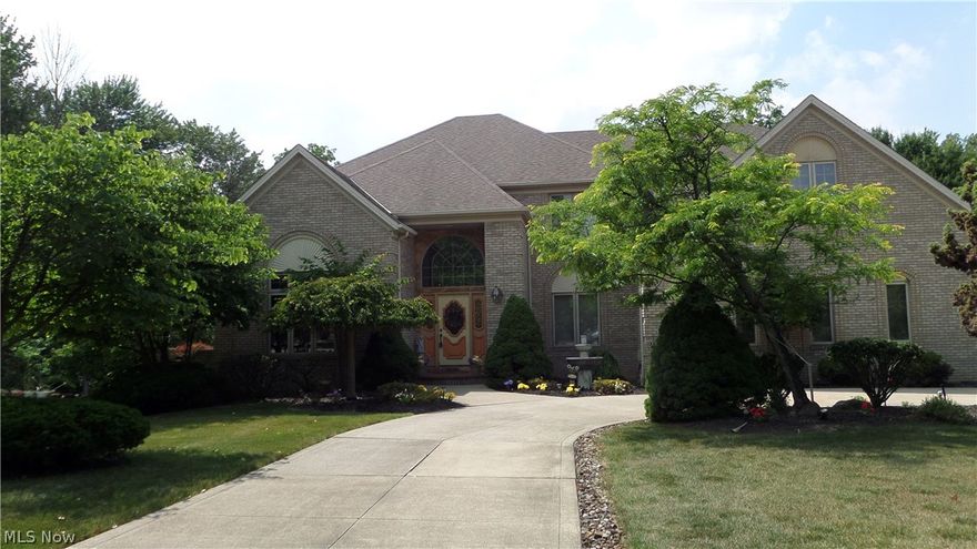 Custom built home perfect for entertaining and upscale living. This home features almost 6,000 sq ft and sits on over 1/2 acres with 4 bedrooms and 6 baths. 3 Of the 4 bedrooms are master suites. One with glamour bath, one with full bath, and one with sitting room and attached full bath that is shared with the 4th bedroom. They all have walk in closets and are located on the second floor. Main floor consists of laundry room with half bath and access to over sized heated 3 and 1/2 car garage. 2 Story marble foyer, another half bath, formal living and dining room, and den, a two story great room with wall of windows and gas fireplace. Kitchen has tons of counter and cabinet space, a breakfast island, eating area, and slider out to the upper deck. Lower level walks out to lower level deck, has a finished 36x24 family room, full bath and custom bar, and stone wood burning fireplace with gas starter. The unfinished side includes a second laundry room and plenty of storage. To complete the house is the 3 tier deck that leads to the inground pool, huge beautiful yard with sprinkler system and 2 story shed.